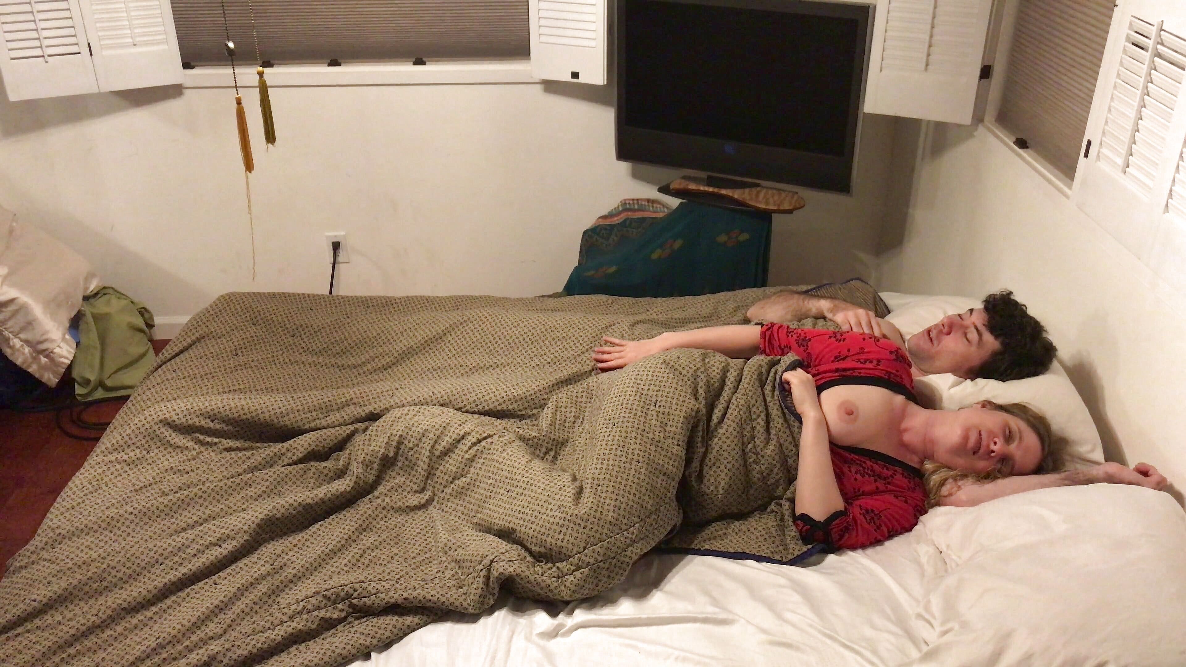Mom son sharing hotel bed